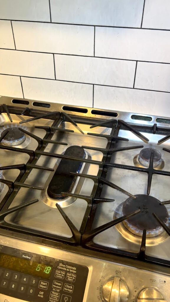 Gas stove range with multiple burners during stove repair in Brampton